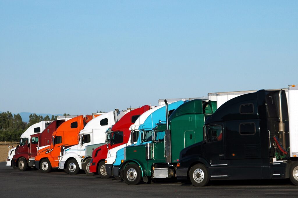 Row of colorful semi trucks